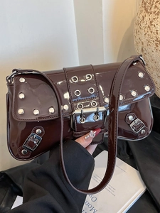 Deep brown patent leather shoulder bag with silver rivet studs and vintage buckle