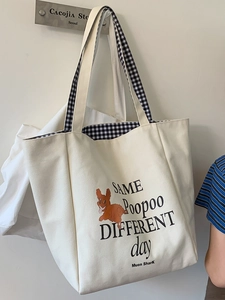 Minimalist canvas tote bag with brown dog illustration and gingham lining detail