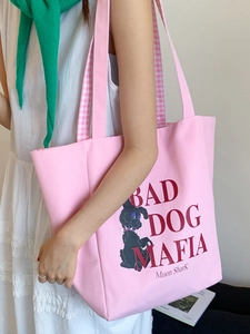 Pink canvas tote bag with black cartoon dog print and stylish alphabet embroidery