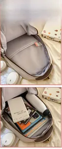 Detail view showing large interior capacity and laptop compartment of the beige backpack