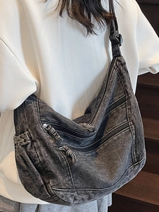 Retro grey oversized denim crossbody bag with multiple zip pockets and adjustable strap