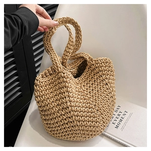 Detailed close-up of thick cotton hand-woven crochet tote bag with unique texture