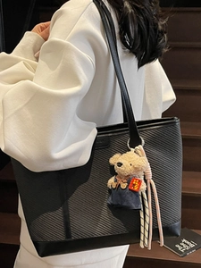 Large black minimalist tote bag for women with cute bear charm for daily commuting