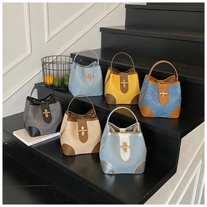 Detailed display of fashionable bucket bags in six colors with metallic twist locks