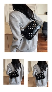 Three-way view of a black polka dot underarm bag on a model in a modern room
