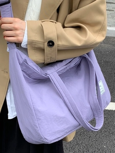 Lavender purple large capacity nylon crossbody bag with wide strap for casual wear