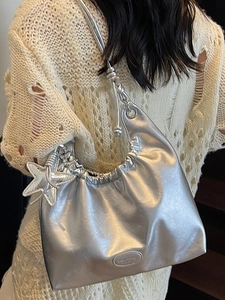Chic silver metallic pleated hobo bag with star pendant and sleek shoulder strap for women