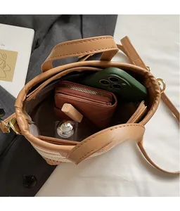 Top view of woven bucket bag interior showing spacious capacity for phone and wallet