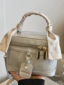 Retro light green bucket bag with silk scarf handle and adjustable crossbody strap