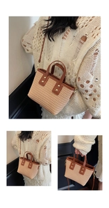 Detailed views of striped straw woven shoulder bag with brown leather straps and gold studs