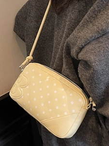 Chic yellow polka dot underarm bag with B logo decoration and slim shoulder strap