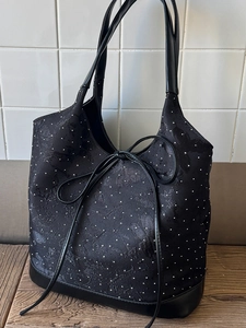 Elegant black tote bag with butterfly jacquard fabric and stylish bow shoulder strap