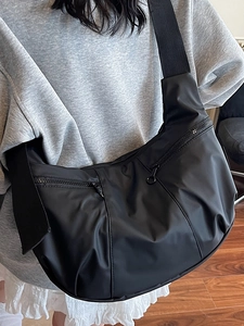Large capacity black crescent nylon crossbody bag with adjustable wide shoulder strap