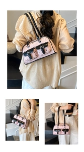 Pink Boston shoulder bag with bunny print, dual front pockets and black leather straps