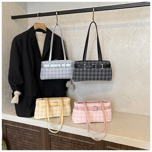 Detail showing checkered shoulder bags in silver, black, yellow, and pink colors