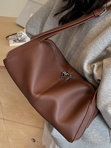Brown lychee grain leather underarm shoulder bag with minimalist rectangular design