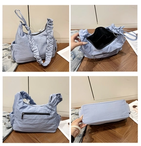 Detailed views of the light blue pleated nylon shoulder bag showing interior and zippers