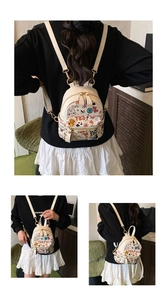 Multiple views showing cartoon graffiti mini backpack with cream finish and cute prints