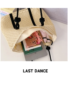 Detailed view showing a woven tote bag interior holding an iPad, umbrella, and notebooks