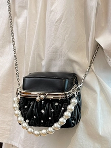 Fashionable black pleated crossbody bag with sparkling rhinestones and pearl handle strap