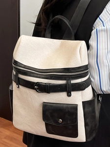 Chic black and white contrast faux leather backpack for women commuting and daily use