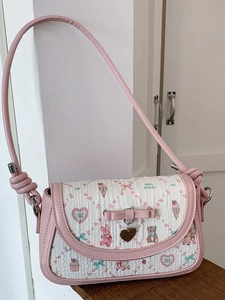 Pink and white ballet-style crossbody bag with cute cartoon prints and bow detail
