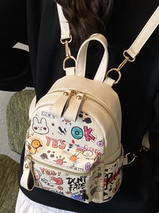 Mini cream leather backpack with colorful graffiti prints and adjustable straps for women