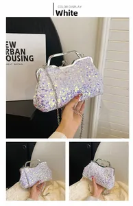 Detailed macro view of white sequined evening clutch bag with metal frame and chain strap