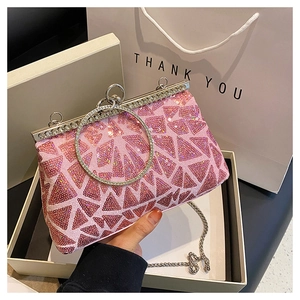 Borsa da sera rosa con paillettes, motivi geometrici e manico ad anello in argento