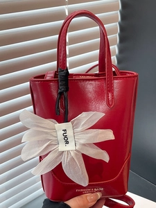 Minimalist red faux leather tote bag with white organza flower charm and double handles