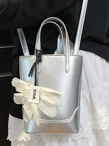 Silver metallic mini tote bag with flower charm for casual commute fashion style