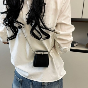 Litchi pattern black leather mini crossbody bag with silver metal kiss-lock and chain strap