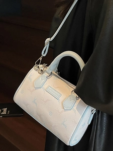 Sac Boston blanc élégant avec imprimé animal et bordure bleue pour mode d'été