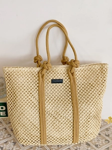 Large capacity beige straw tote bag with black leather patch and thick cotton rope handles