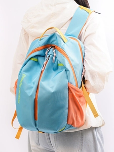 Sky blue large capacity backpack with orange and yellow accents for outdoor activities