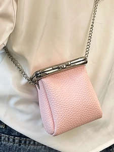 Pink litchi grain leather mini lipstick bag with silver chain strap and metal frame clasp