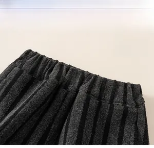 Detail of the comfortable elastic waistband on children's thick fleece-lined winter trousers