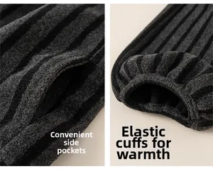 Detail of fleece-lined striped kids trousers showing side pockets and elastic ribbed cuffs