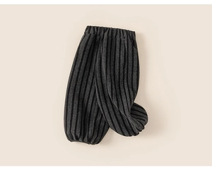 Detail of thickened black and gray striped children's pants with elastic waist and ribbed cuffs