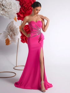 Elegant rose pink strapless evening gown with sequin details and a high side slit
