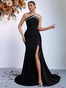 Elegant black halter evening gown with silver rhinestones and high side slit