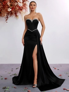 Elegant strapless black satin evening gown with diamond accents and high side slit