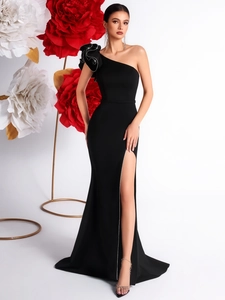 Elegant black one-shoulder evening gown with 3D floral accent and high side slit