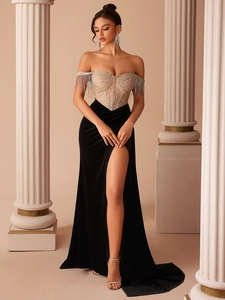 Luxury strapless black velvet evening gown with silver rhinestones and high slit