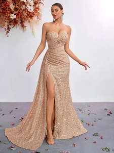 Elegant champagne sequin strapless evening gown with side slit and mermaid tail design