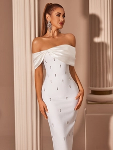 Elegant white off-shoulder evening dress featuring shimmering rhinestones and satin pleats