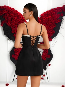 Elegant black satin dress with pearl beaded straps and backless rose backdrop design