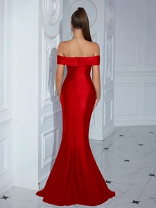 Detailed back view of a red off-the-shoulder mermaid evening gown with a sleek floor-length hem