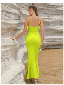 Rear view of sleek neon green bodycon dress with delicate straps and fishtail hem