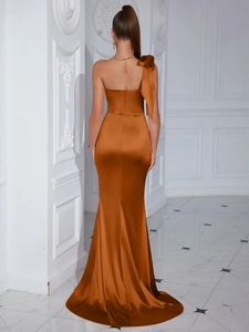 Elegant one-shoulder satin evening dress with oversized bow and mermaid hemline